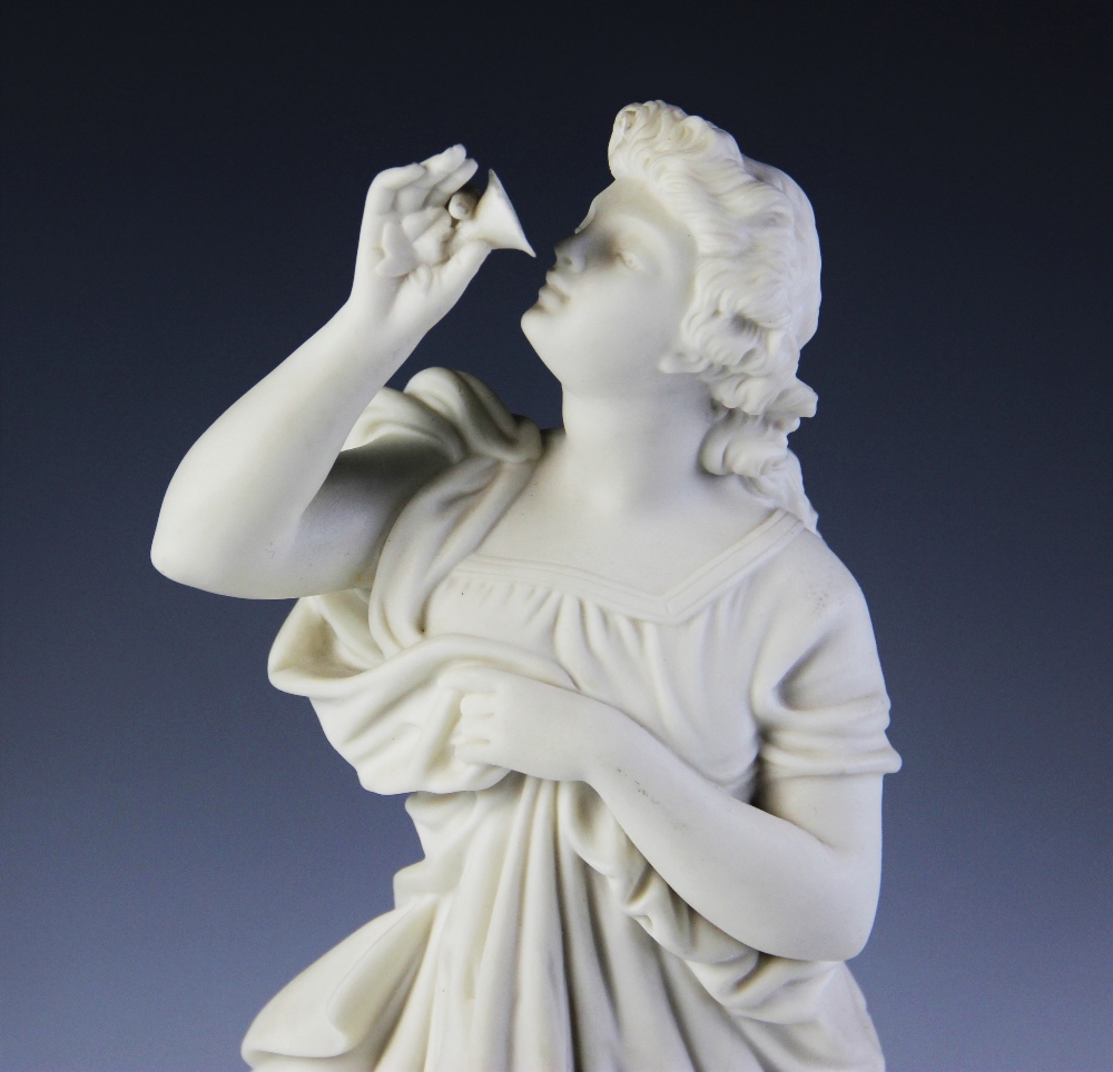 A Parian ware figure of a flower picker, modelled standing with her hand aloft smelling a flower, - Image 3 of 4