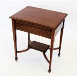 An Edwardian inlaid mahogany lady's writing desk, the moulded hinged top concealing a stationery