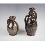 A treacle glazed Hungarian folk art Miska kancso (Mickey Jug) style character jug, 20th century,