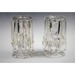 A pair of Victorian clear glass lustres, late 19th century, of typical form with alternating spear