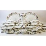 A Wedgwood dinner service in the 'Hathaway Rose' pattern, comprising; twelve dinner plates, nine