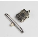 A Victorian silver vinaigrette pendant by Alfred Taylor, Birmingham 1865, of rectangular form with