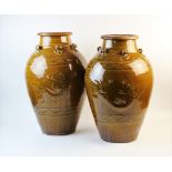 A large pair of Chinese treacle glazed sgraffito vases, 20th century, each stoneware vase externally