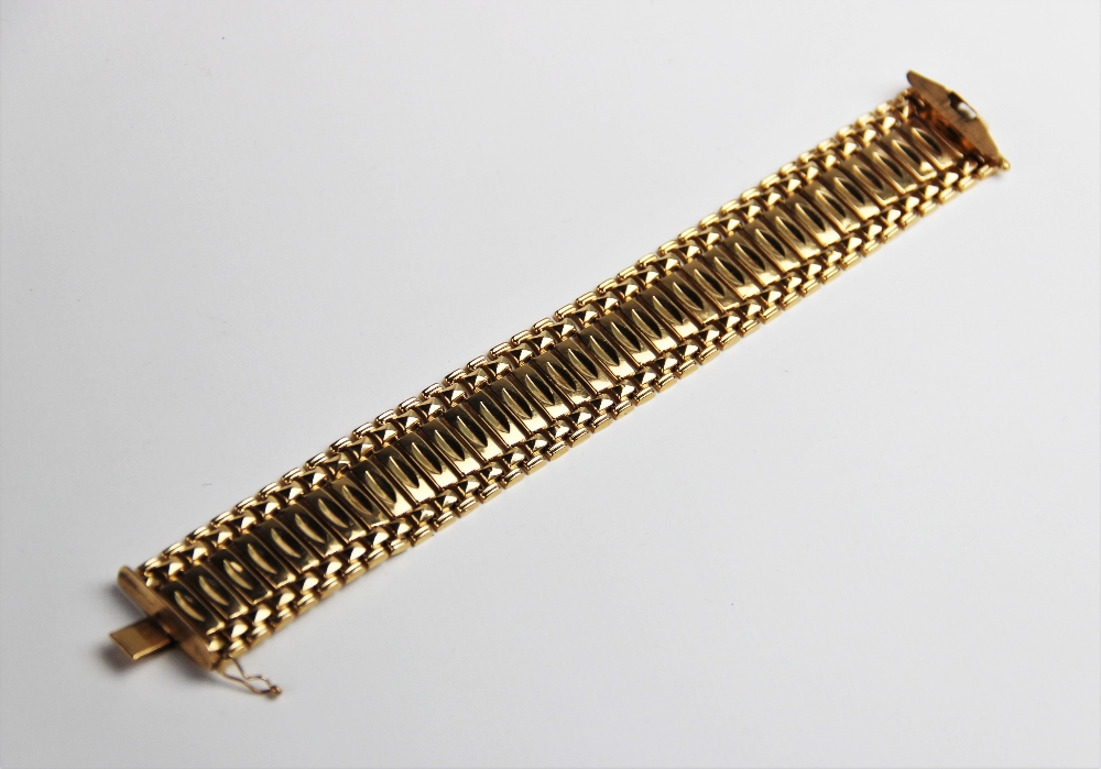 An 18ct yellow gold bracelet, comprising thirty-seven rectangular panels with brick-link borders, - Image 3 of 3