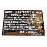 An early 20th century cast iron railway sign, circa 1910, of rectangular form, with cast relief
