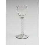 A George III wine glass, late 18th century, of typical form with air twist stem, 15.5cm high