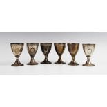 A set of six silver gilt goblets by CJ Vander, London 1973, of typical form on circular spreading