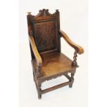 A 17th century and later oak Wainscot chair, the panel back with incised geometric detail flanked by