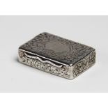 A silver snuff box by Edward Smith, Birmingham 1851, of rectangular form engraved scrolling