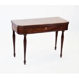 An early 19th century mahogany folding tea table, in the manner of Gillows, the rectangular hinged