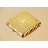 A George V 9ct gold cigarette case by Mappin & Webb, of rectangular form with engine turned