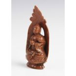 A 20th century carved goldstone model of Buddha, modelled seated upon a lotus crown base, 18.5cm