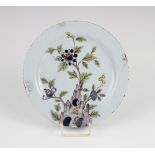 An 18th century Delft plate, possibly Liverpool circa 1760, the earthenware tin glaze circular plate