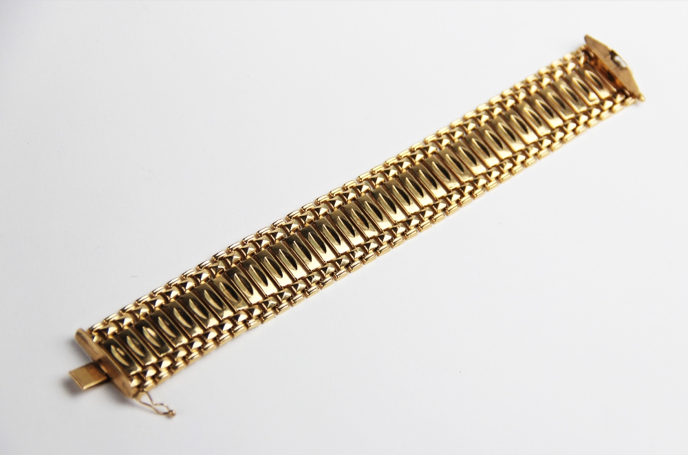 An 18ct yellow gold bracelet, comprising thirty-seven rectangular panels with brick-link borders, - Image 2 of 3