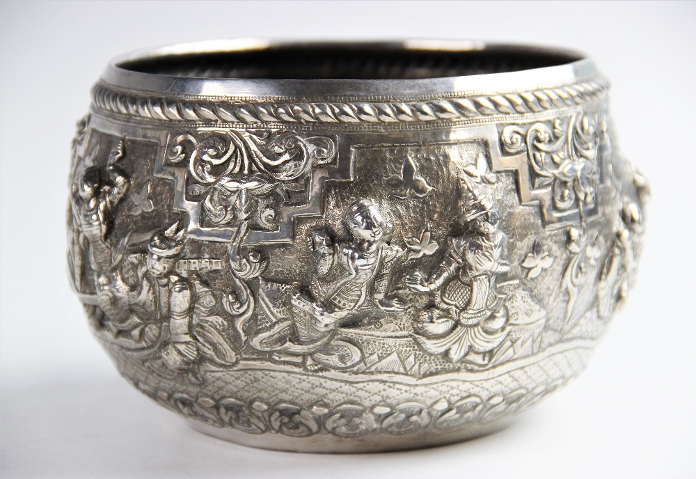 A late 19th/early 20th century Burmese white metal bowl, of circular form decorated in high relief - Image 3 of 6