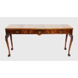 A George II style figured walnut serving or console table, mid 20th century, the cross banded