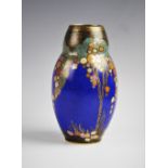 A Crown Devon Art Deco vase, circa 1930s, of bulbous form, decorated in pattern 2073 with gilt and