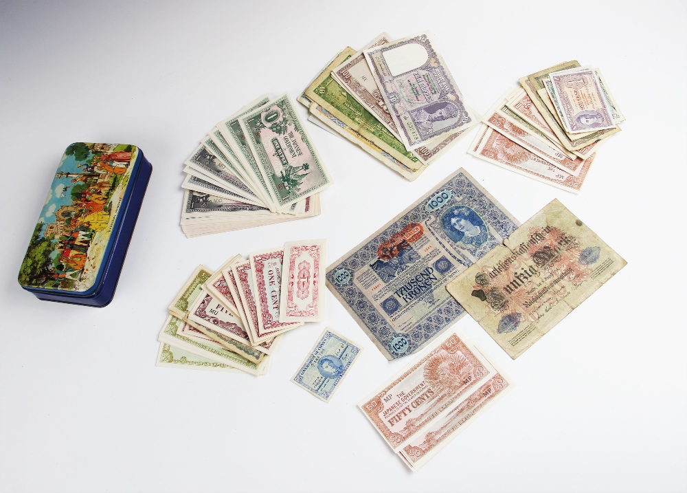 A collection of world bank notes, predominately post-war examples,