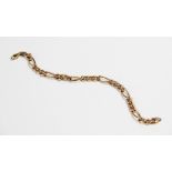 A 9ct gold figaro link bracelet, with lobster claw and loop fastening, 20.3cm long, weight 4.8gms