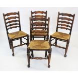 A set of four 18th century style oak ladder back kitchen chairs, 20th century, each with five