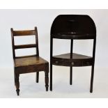 A George III mahogany bowfront corner wash stand, the upper shelf with the circular bowl/cup