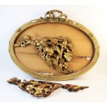 A mid-19th century giltwood and gesso oval frame, with ribbon bow crested surmount, 79cm wide with a