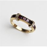 A ruby and diamond 9ct gold dress ring, comprising eight square step cut rubies and six single cut