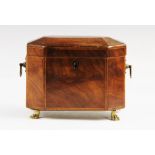 A Regency mahogany tea caddy, of octagonal form, applied with rosewood crossbanding, opening to a