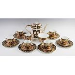 A Royal Crown Derby Imari pattern tea service, 20th century, comprising: a teapot and cover, six tea