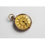 An Edwardian 9ct gold lady's fob watch, London import marks for 1907, the gold toned dial with