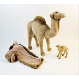 A vintage Steiff plush toy camel, circa 1950s, paper label to neck, 15cm high, with a large Steiff