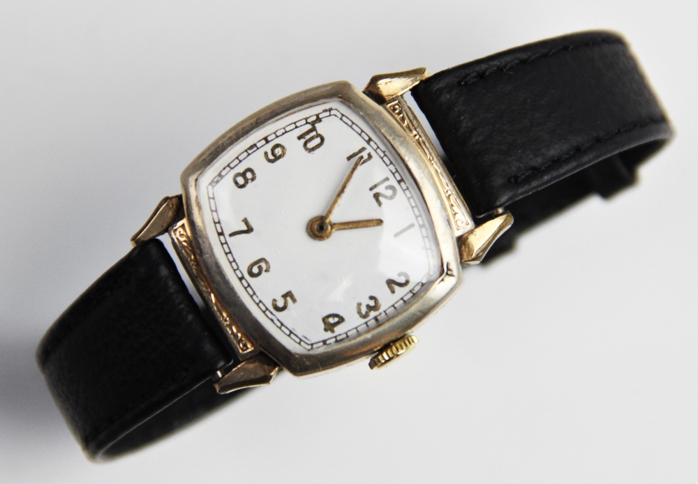 A vintage wristwatch, the white enamel dial with gold toned Arabic numerals and outer seconds track, - Bild 4 aus 4