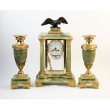 A late 19th century French green alabaster and four glass clock garniture, the case surmounted