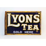 An early 20th century wall mounted 'Lyons Tea' double sided enamelled sign, the white text with