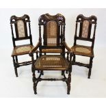 A set of four oak Carolean style dining chairs, late 19th century, each with a rattan panel back
