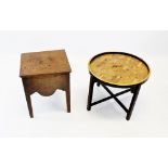 An early 20th century folding table, the circular parquetry tray top with ebonised rim raised upon a