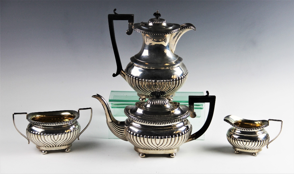 An Edwardian four piece silver tea service by Joseph Gloster Ltd, Birmingham 1907/08, comprising - Image 2 of 3