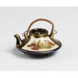 A Japanese satsuma porcelain kettle, Meiji period (1868-1912), the kettle of small proportions