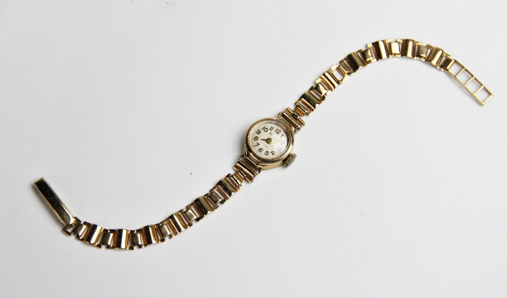 A vintage lady's 9ct Regency wristwatch, the round cream with with Arabic numerals, set to a round - Bild 3 aus 4