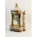 A late 19th century French Carrara marble four glass mantel clock, the ormolu embellished