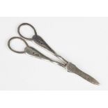 A pair of George V silver grape scissors by Harrison Brothers & Howson, Sheffield 1913, of plain