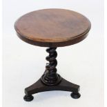 A Victorian mahogany pedestal occasional table, the circular moulded top raised upon a barley