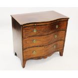 A late 18th /early 19th century mahogany and rosewood cross banded serpentine chest of drawers,