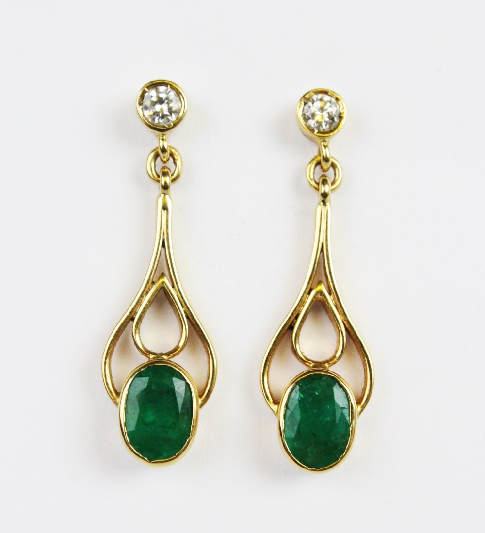 An emerald and diamond pendant and earring suite, the pendant comprising an oval mixed cut emerald - Image 4 of 4