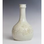 A mid 18th century salt glazed creamware guglet/bottle vase, of typical form and externally