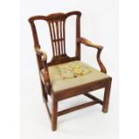 A George III elm and fruitwood country Chippendale style elbow chair, the pierced splat back flanked