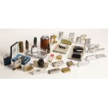 A collection of cigarette lighters, including Zippo type lighters, table lighters, advertising