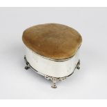 An Edwardian silver jewellery box by Henry Matthews, Birmingham 1909, of shaped form with pin