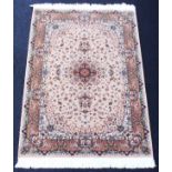 A sand ground fine woven rug, full pile, 148cm x 100cm