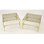 A pair of mid 20th century gilt metal and smoked glass lamp tables, the square glass tops